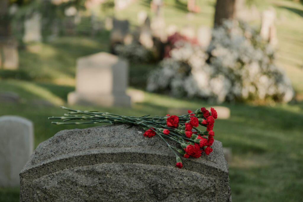 roses on top of St Petersburg FL tombstone
